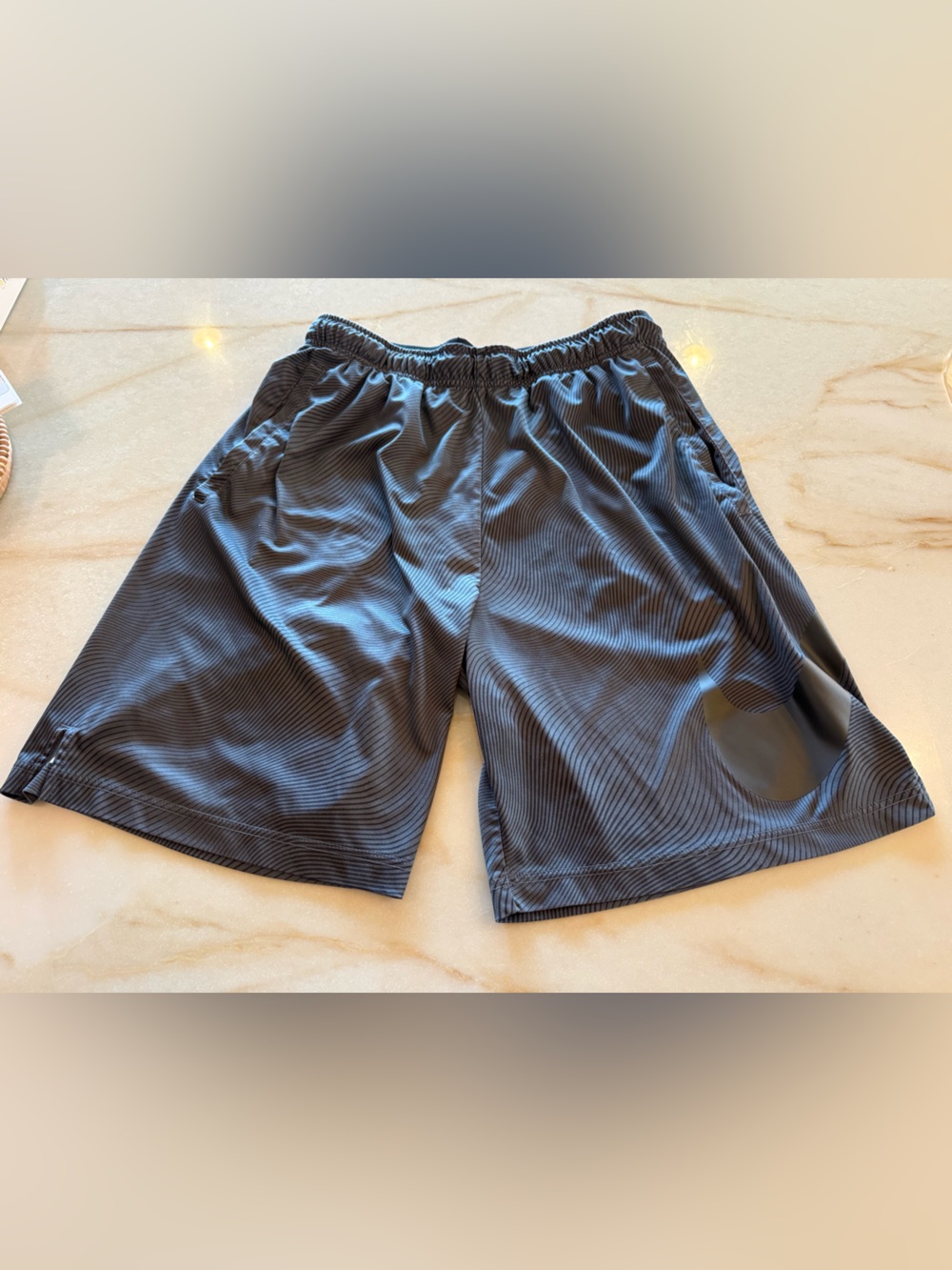Nike Men's Black Athletic Shorts with Subtle Stripe Texture